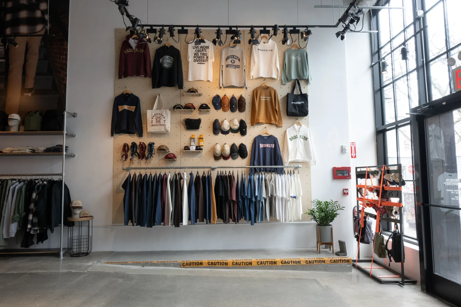 Wall-mounted apparel and accessory displays in the Williamsburg flagship.