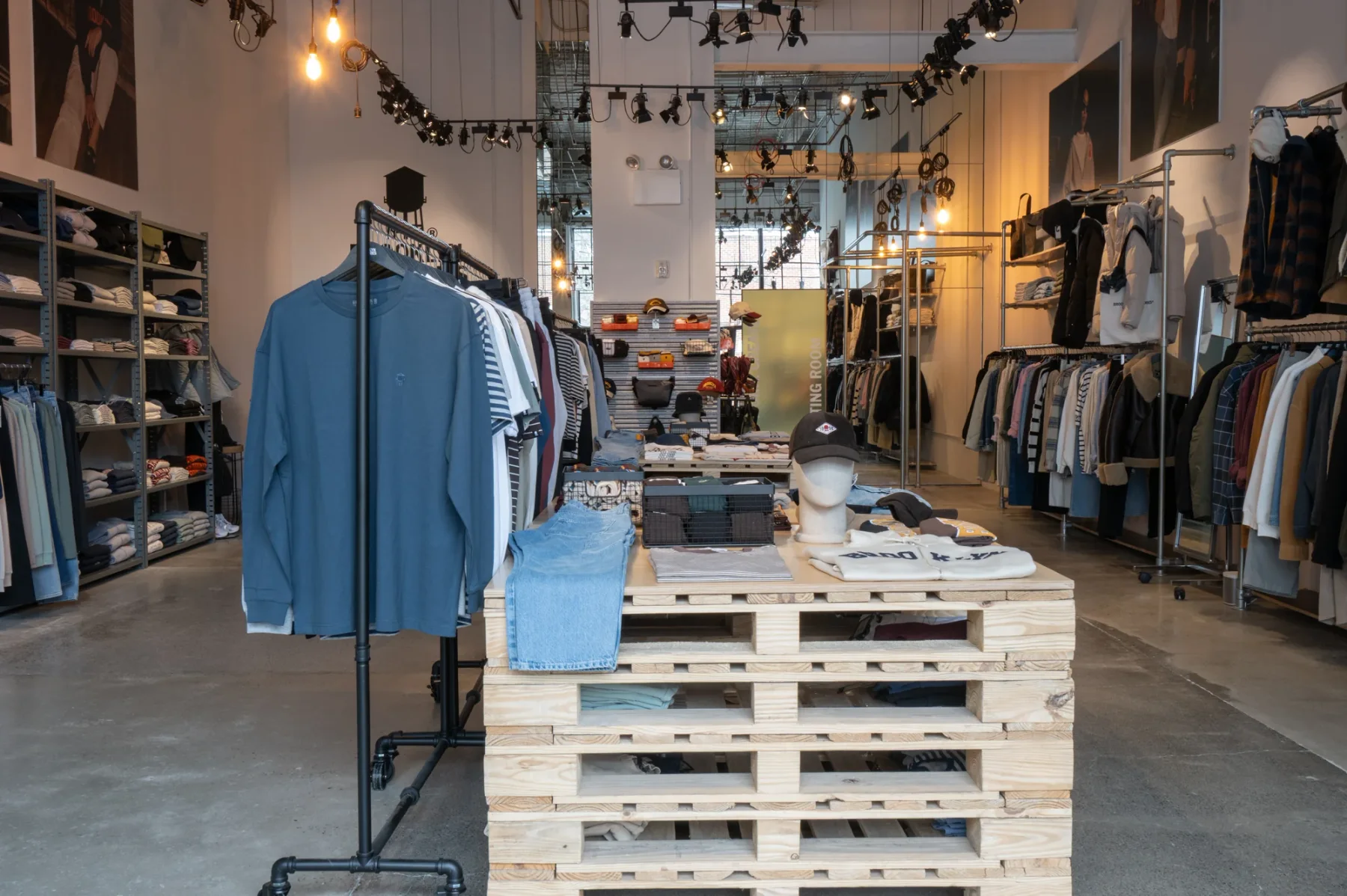 Brooklyn Industries retail floor with apparel displays and pallet tables