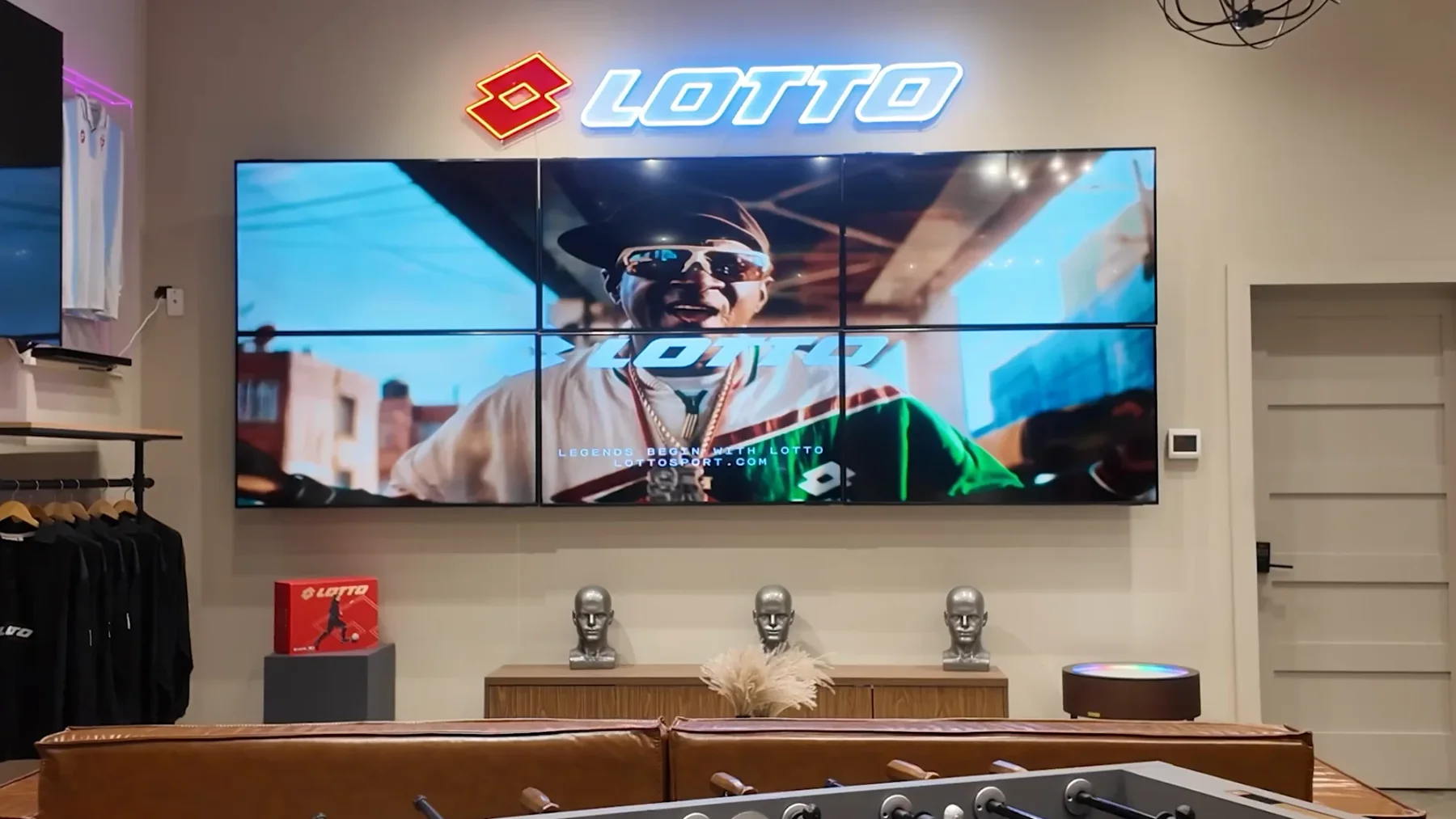 Lotto's lounge at American Dream, with leather seating, a video wall and foosball table